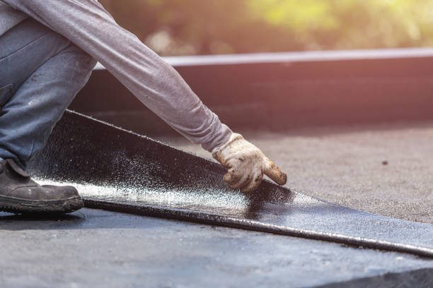 Professional Basement Waterproofing technician working in Houston, PA